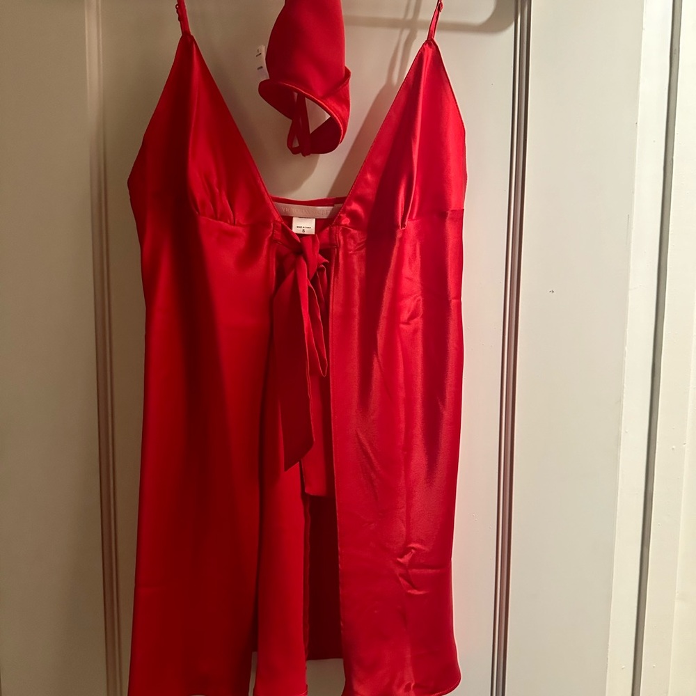 Victoria’s Secret slip Teddy. Open front that ties.
